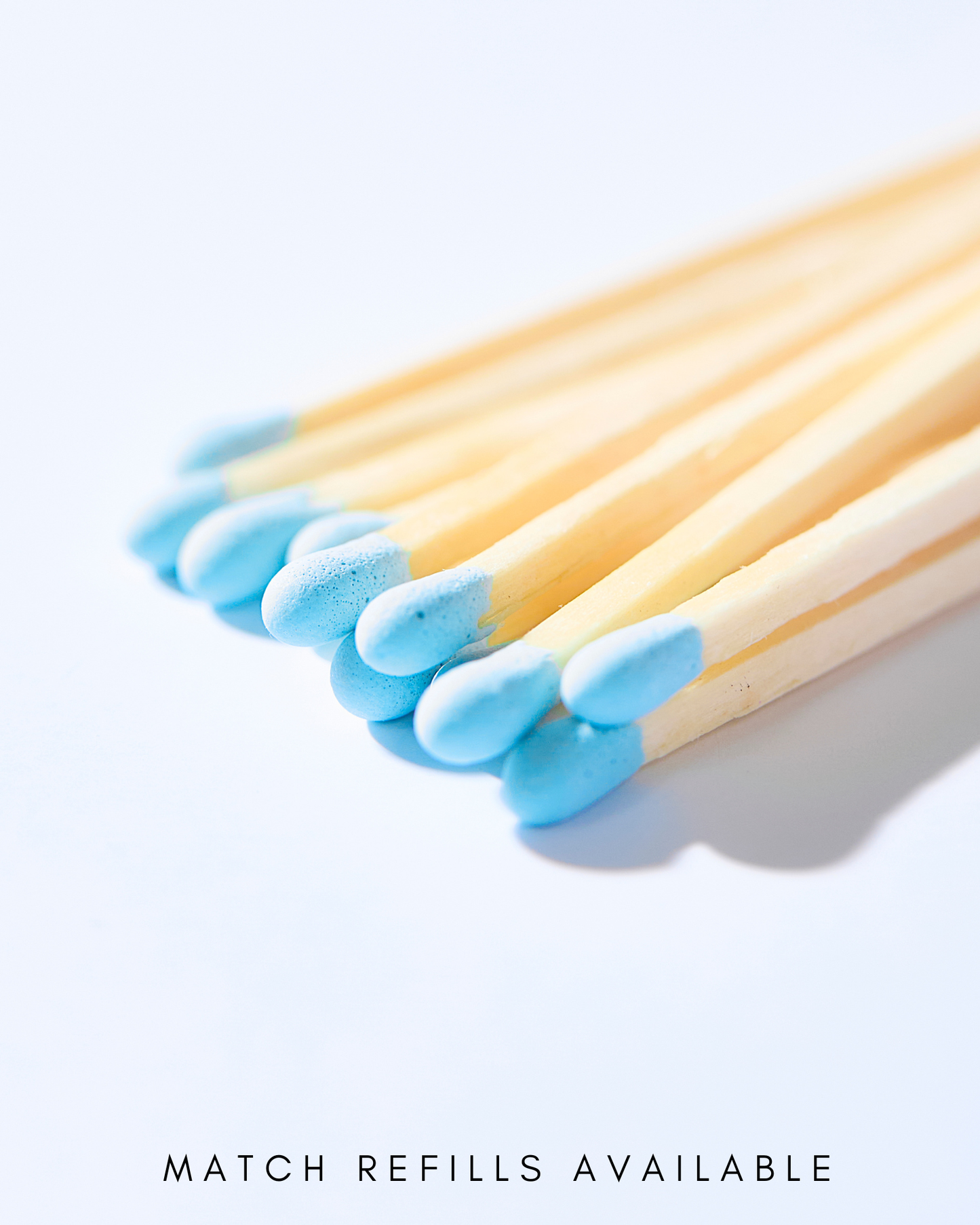 Light Blue Matches in Round Glass Container
