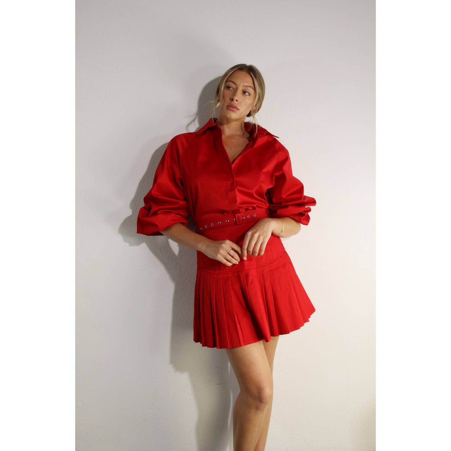 RED SHIRT AND PLEATED SKIRT SET