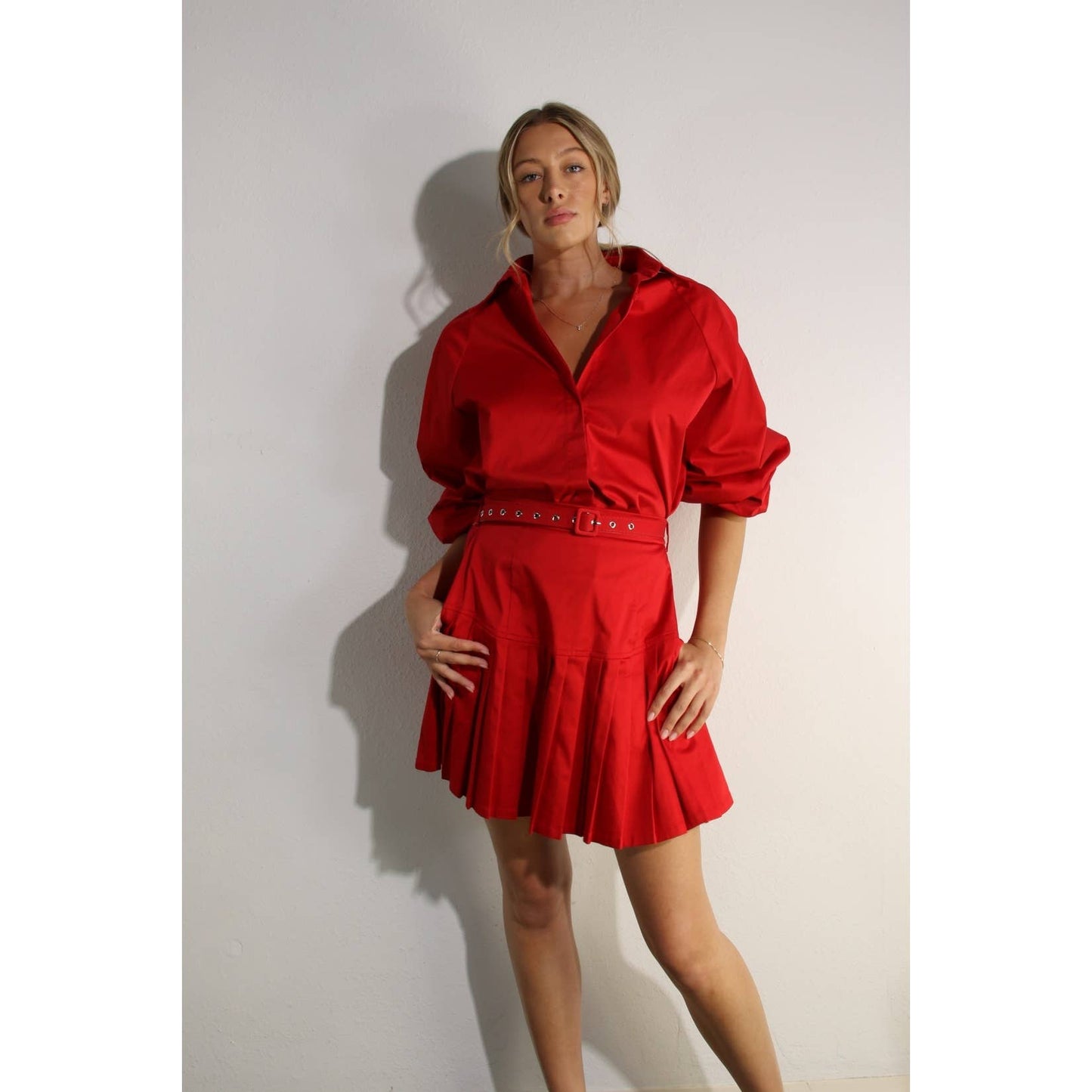 RED SHIRT AND PLEATED SKIRT SET