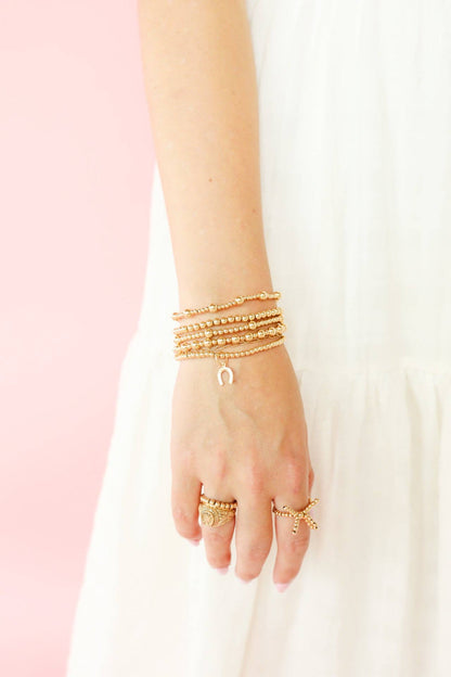 Horseshoe Gold Charm Bracelet: Petite