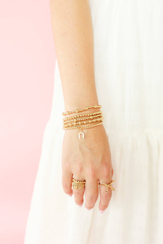 Horseshoe Gold Charm Bracelet: Petite